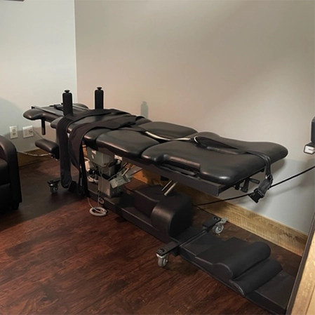 Spinal Decompression Table In Room With Wood Floors